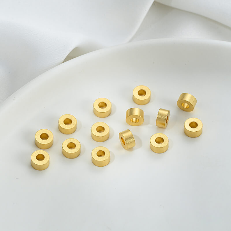 Gold wheel spacer beads, copper coin spacer, cylindrical barrel beads, lion awakening beads