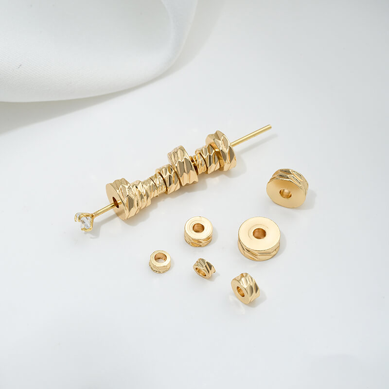 Cut-faced flat sheet spacer beads