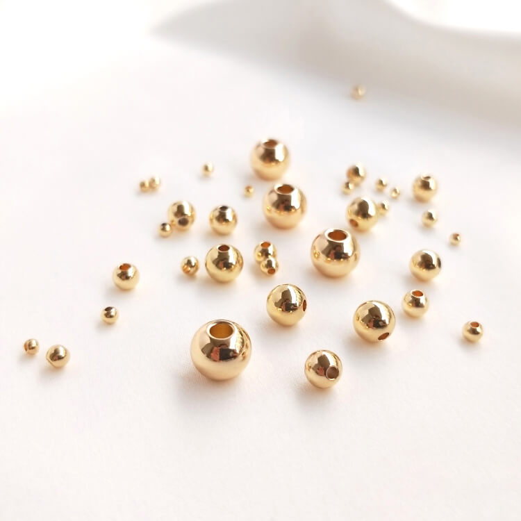 14k gold-plated scattered pearls polished round beads bracelet isolated beads