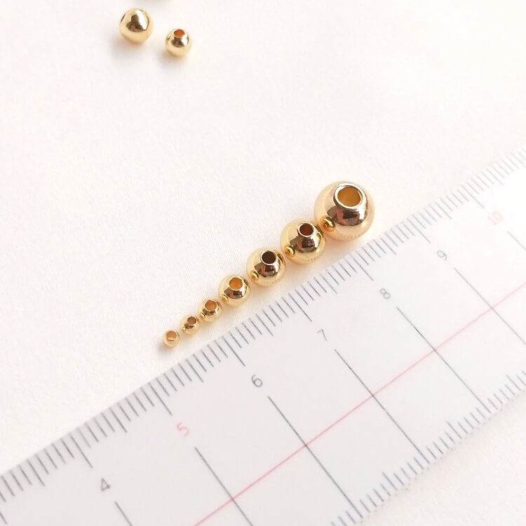 14k gold-plated scattered pearls polished round beads bracelet isolated beads