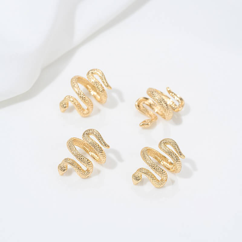 Snake-shaped spacer bead ring with zircon