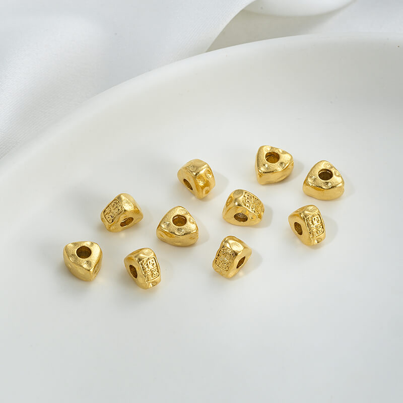 Gold wheel spacer beads, copper coin spacer, cylindrical barrel beads, lion awakening beads