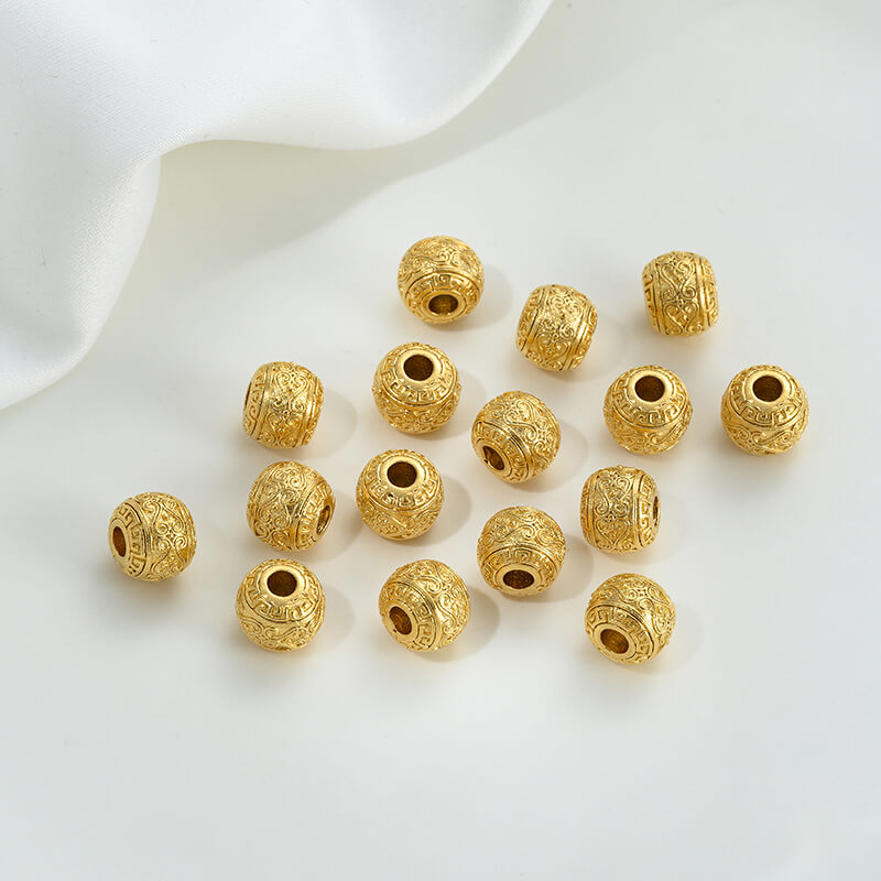 Gold wheel spacer beads, copper coin spacer, cylindrical barrel beads, lion awakening beads