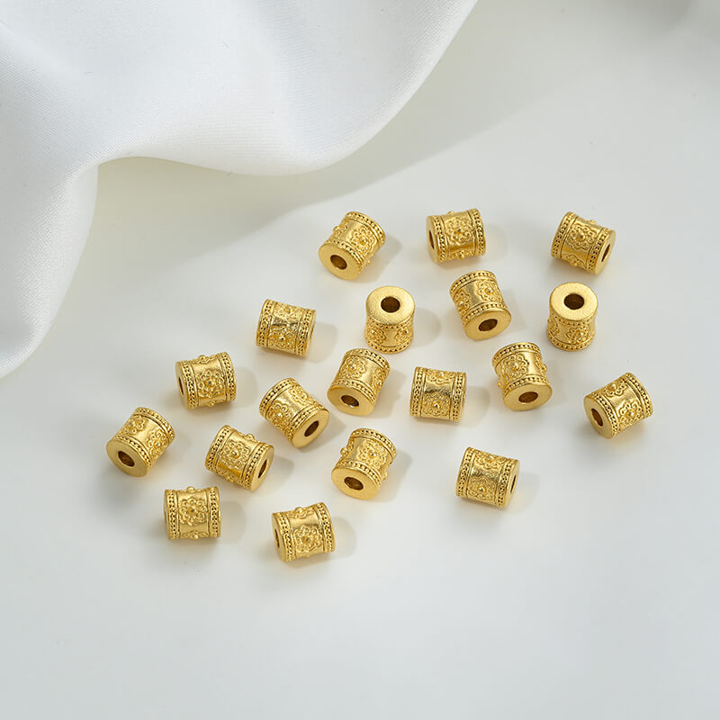 Gold wheel spacer beads, copper coin spacer, cylindrical barrel beads, lion awakening beads