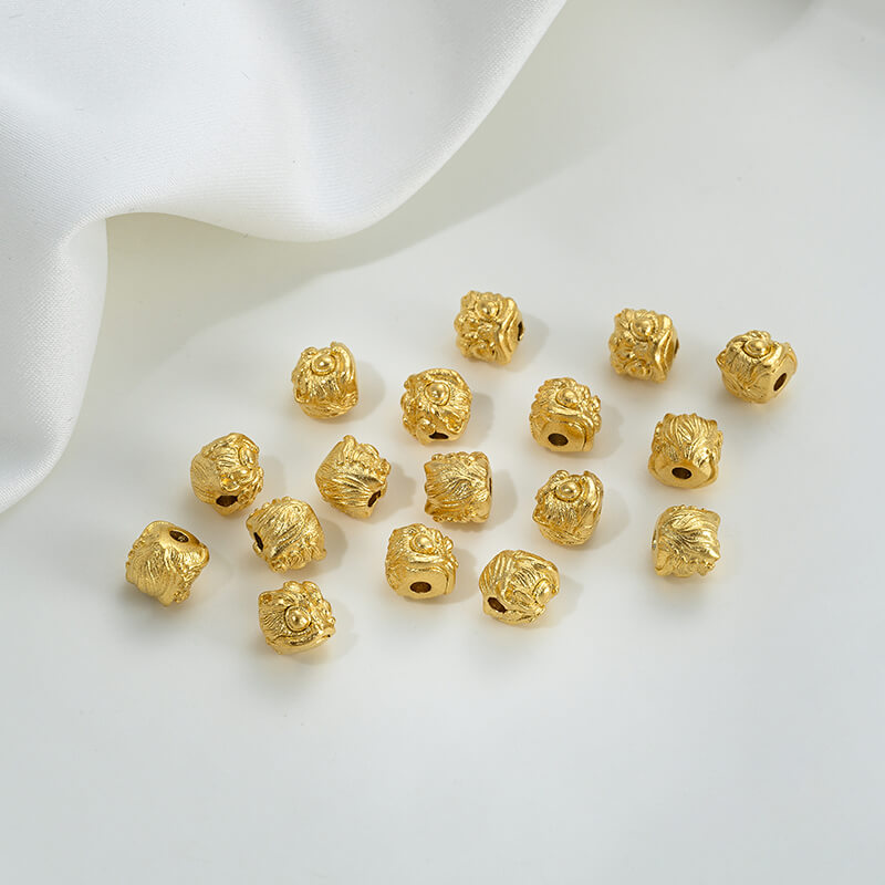 Gold wheel spacer beads, copper coin spacer, cylindrical barrel beads, lion awakening beads