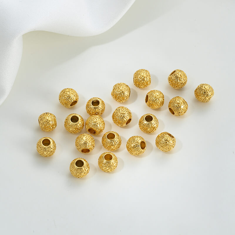 Gold wheel spacer beads, copper coin spacer, cylindrical barrel beads, lion awakening beads