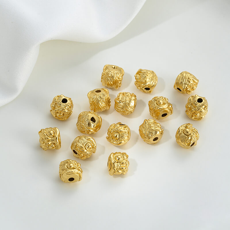 Gold wheel spacer beads, copper coin spacer, cylindrical barrel beads, lion awakening beads