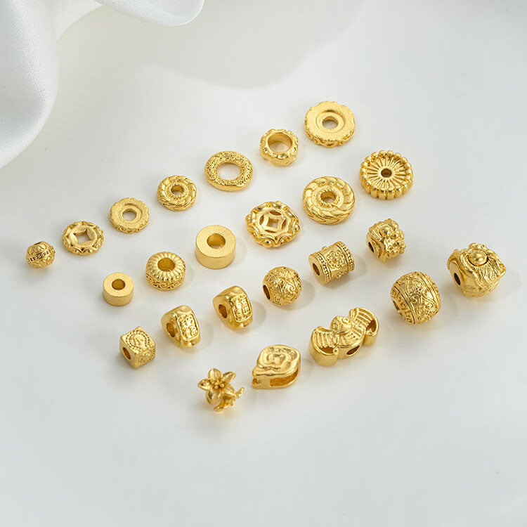 Gold wheel spacer beads, copper coin spacer, cylindrical barrel beads, lion awakening beads