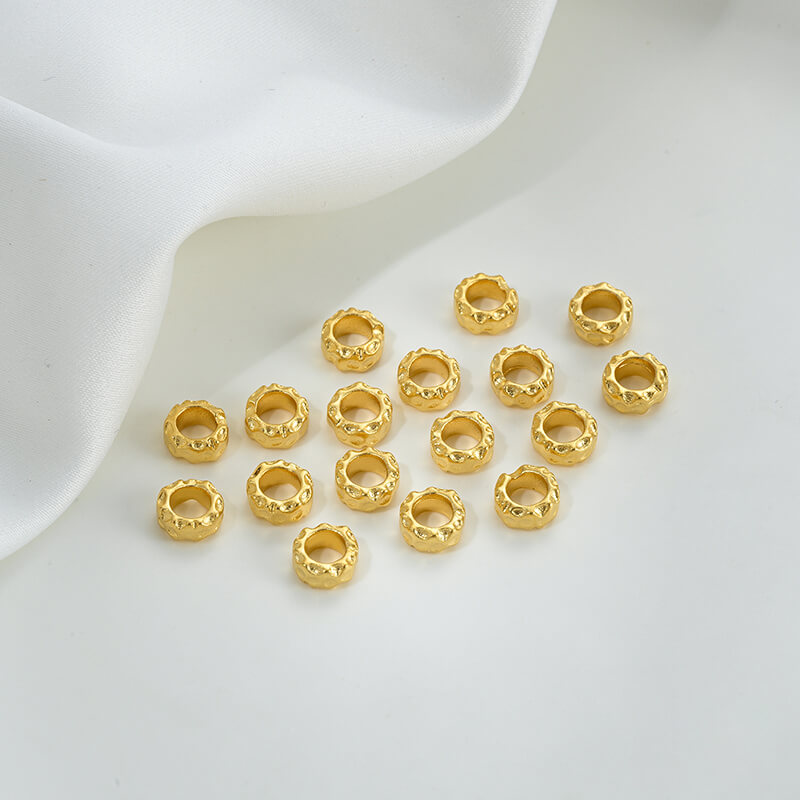 Gold wheel spacer beads, copper coin spacer, cylindrical barrel beads, lion awakening beads