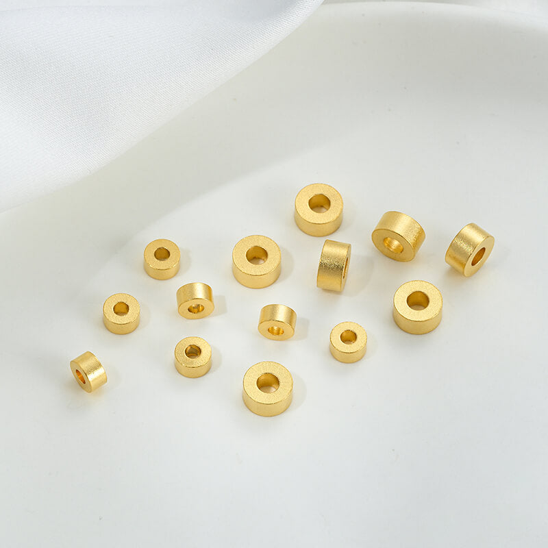 Gold wheel spacer beads, copper coin spacer, cylindrical barrel beads, lion awakening beads