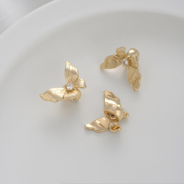 Zirconium-inlaid butterfly spacer beads with holes