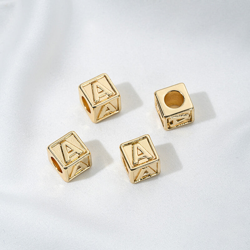Titanium steel with gold-plated 26 letters square through-hole relief spacer