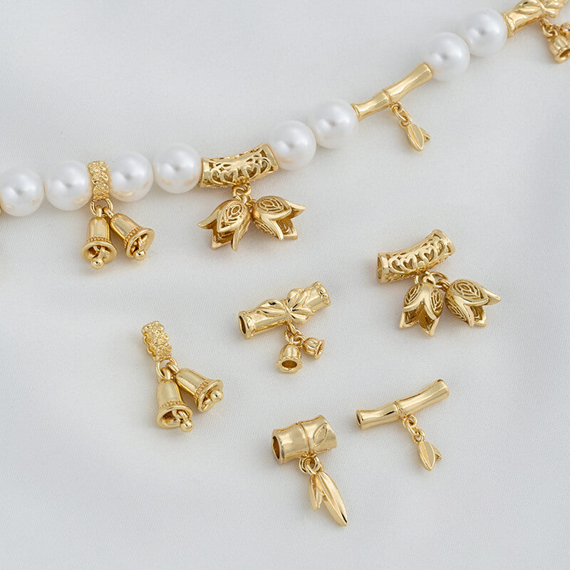 Bamboo tube with beads and bamboo leaves, garland, lily of the valley bell pendant