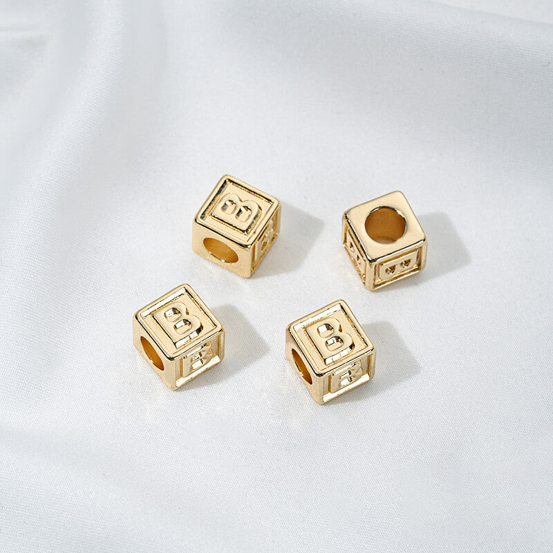 Titanium steel with gold-plated 26 letters square through-hole relief spacer