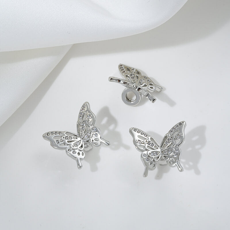 Zirconium-inlaid butterfly spacer beads with holes