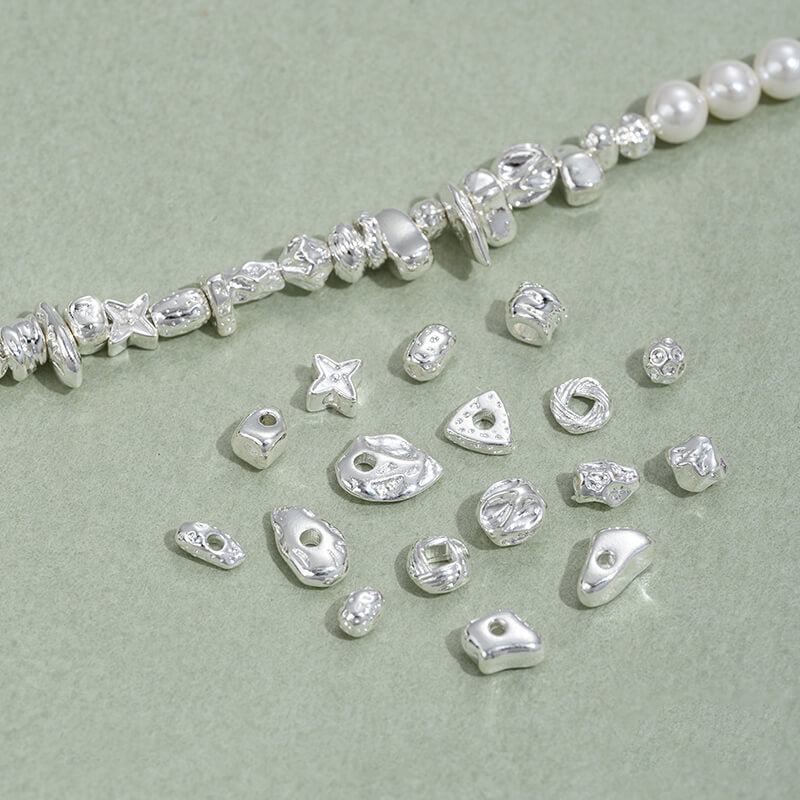 Copper-clad thick sterling silver irregular stone-shaped spacer beads