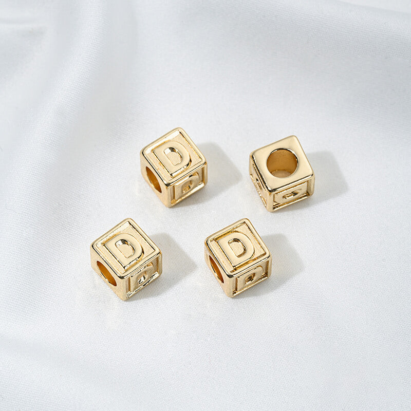 Titanium steel with gold-plated 26 letters square through-hole relief spacer