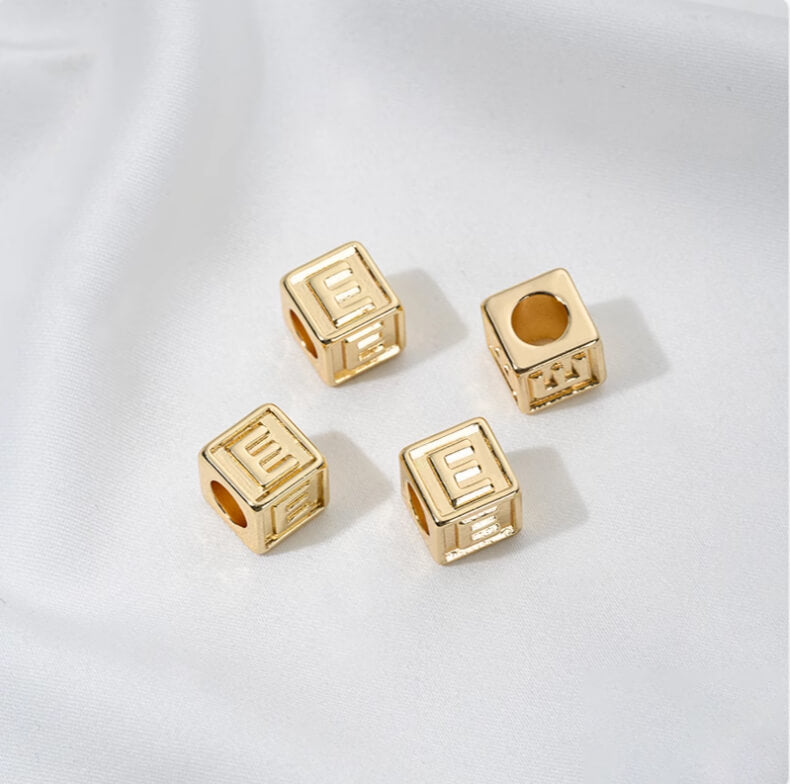 Titanium steel with gold-plated 26 letters square through-hole relief spacer