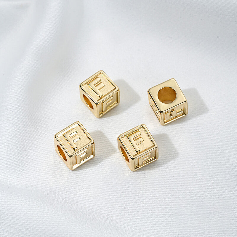 Titanium steel with gold-plated 26 letters square through-hole relief spacer