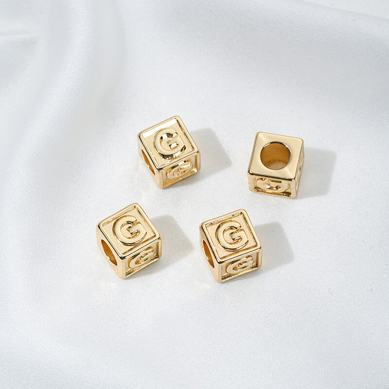Titanium steel with gold-plated 26 letters square through-hole relief spacer