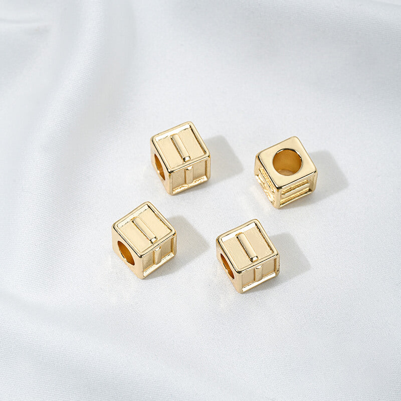 Titanium steel with gold-plated 26 letters square through-hole relief spacer