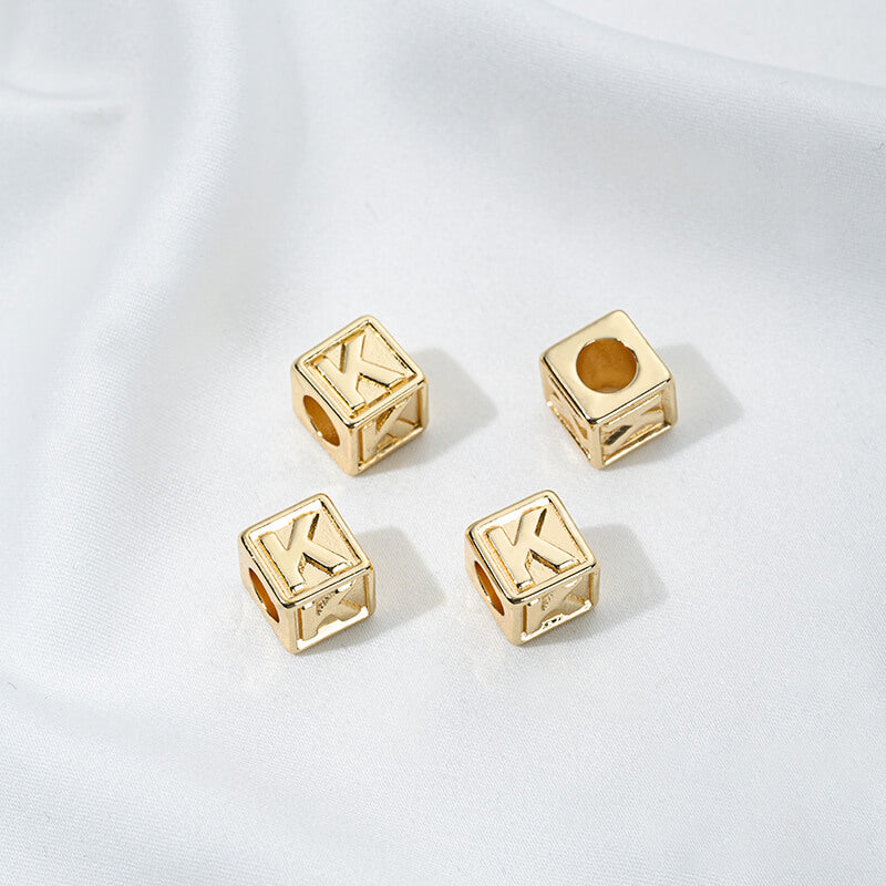 Titanium steel with gold-plated 26 letters square through-hole relief spacer