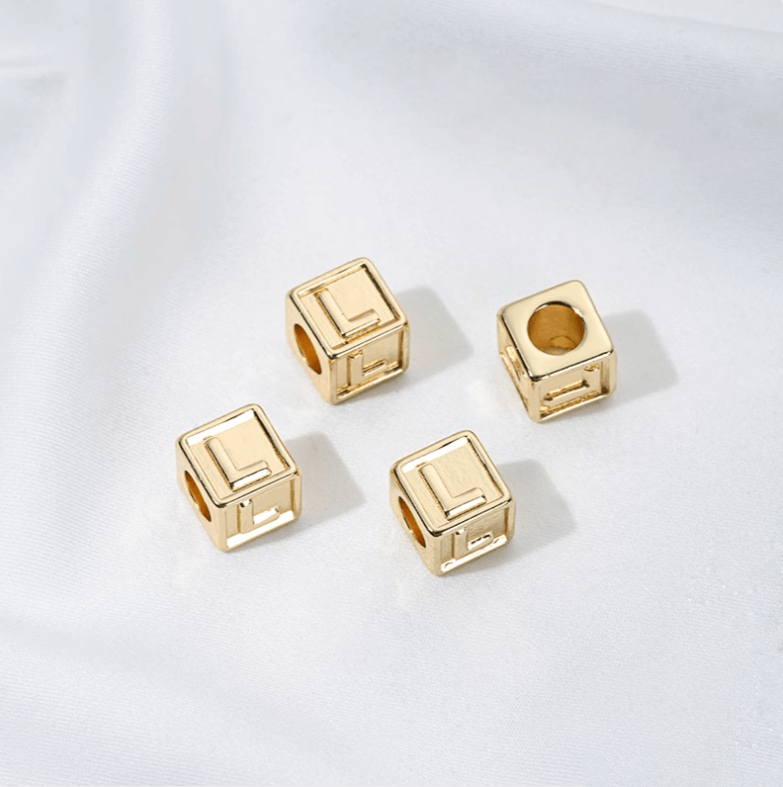 Titanium steel with gold-plated 26 letters square through-hole relief spacer
