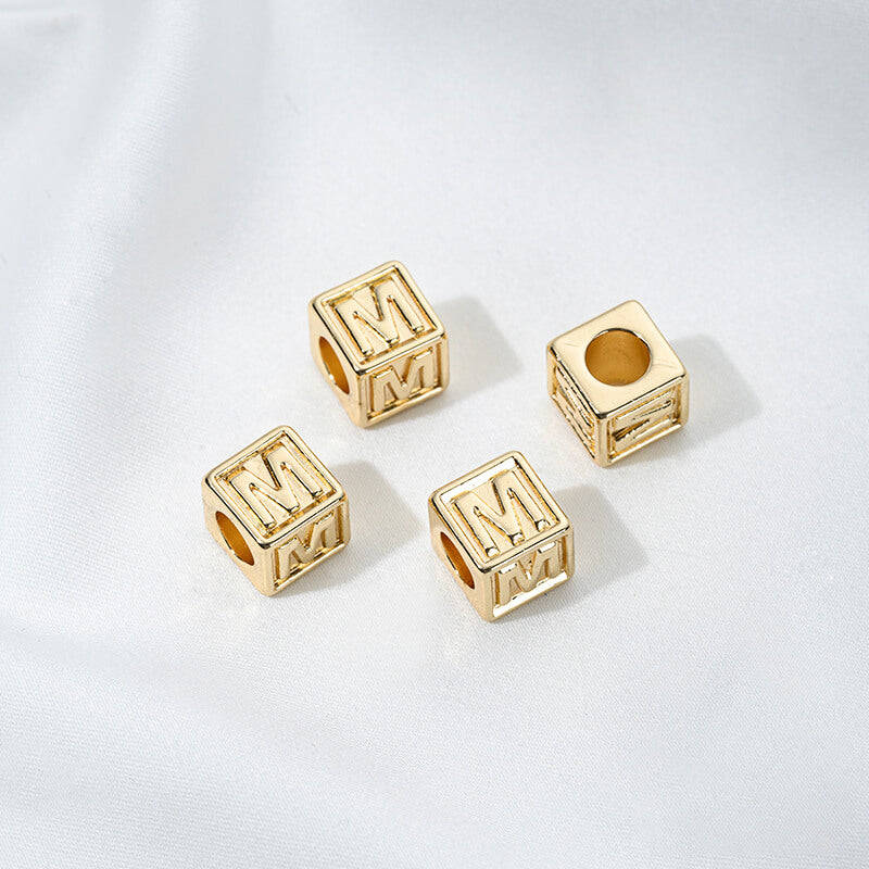 Titanium steel with gold-plated 26 letters square through-hole relief spacer