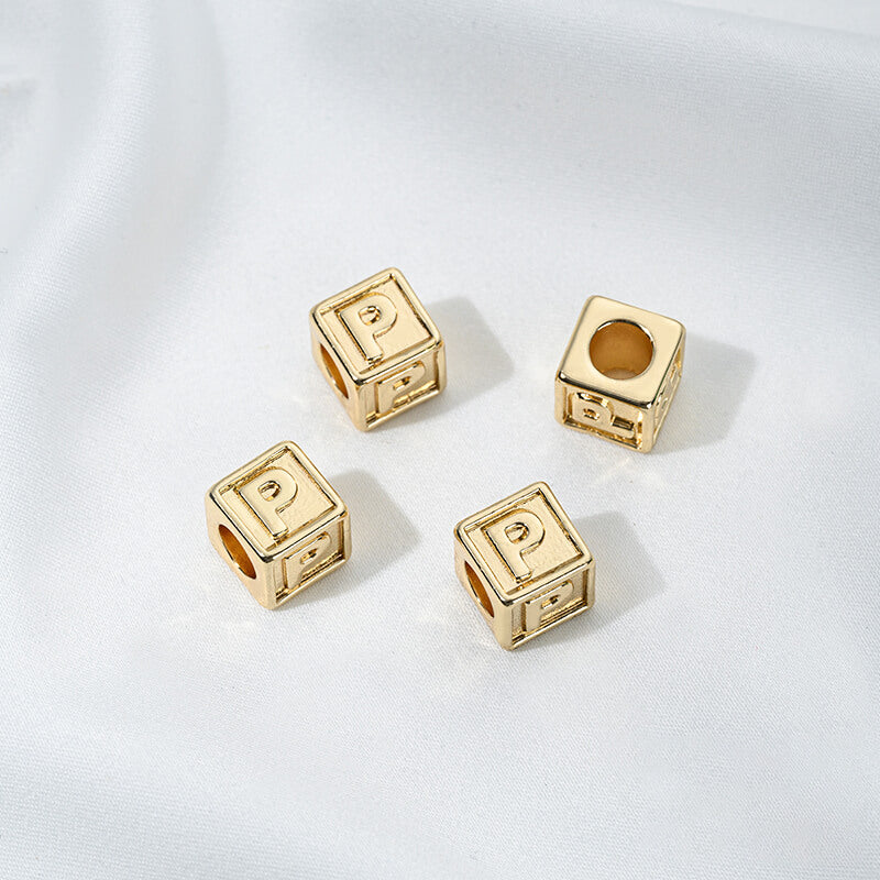 Titanium steel with gold-plated 26 letters square through-hole relief spacer