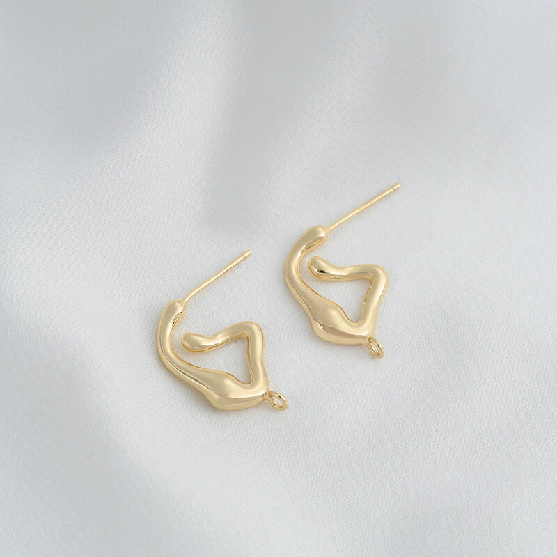 C-shaped lava earrings with hanging rings and diamond-faced earrings