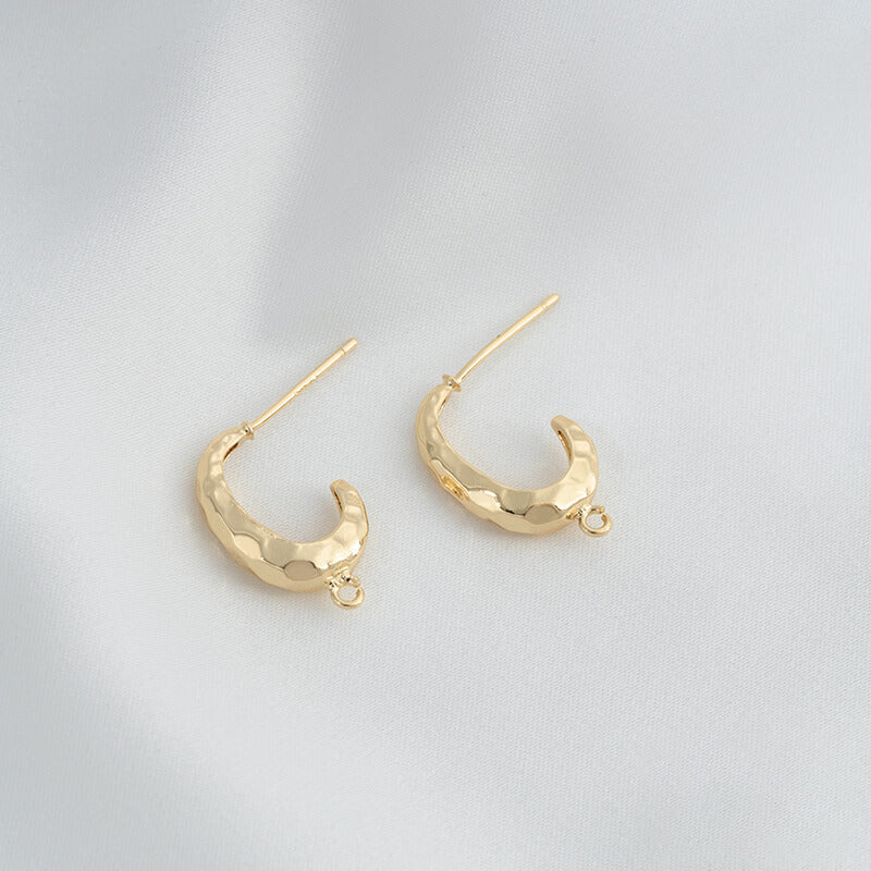 C-shaped lava earrings with hanging rings and diamond-faced earrings