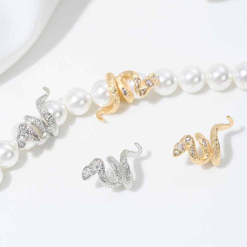 Snake-shaped spacer bead ring with zircon