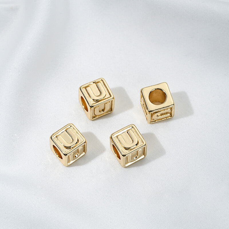 Titanium steel with gold-plated 26 letters square through-hole relief spacer