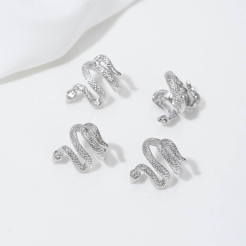 Snake-shaped spacer bead ring with zircon