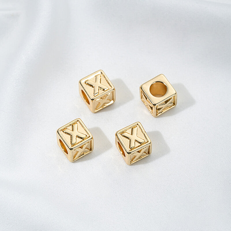 Titanium steel with gold-plated 26 letters square through-hole relief spacer