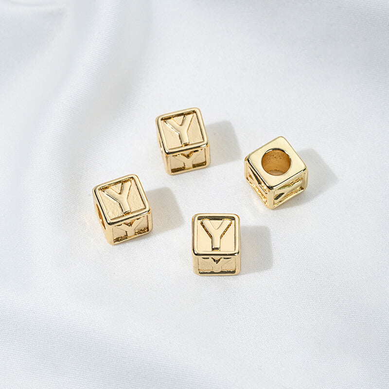 Titanium steel with gold-plated 26 letters square through-hole relief spacer