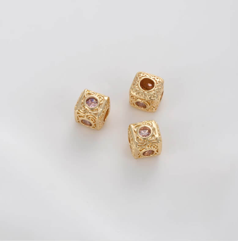 Retro pattern with colored zirconium square spacer beads on all four sides