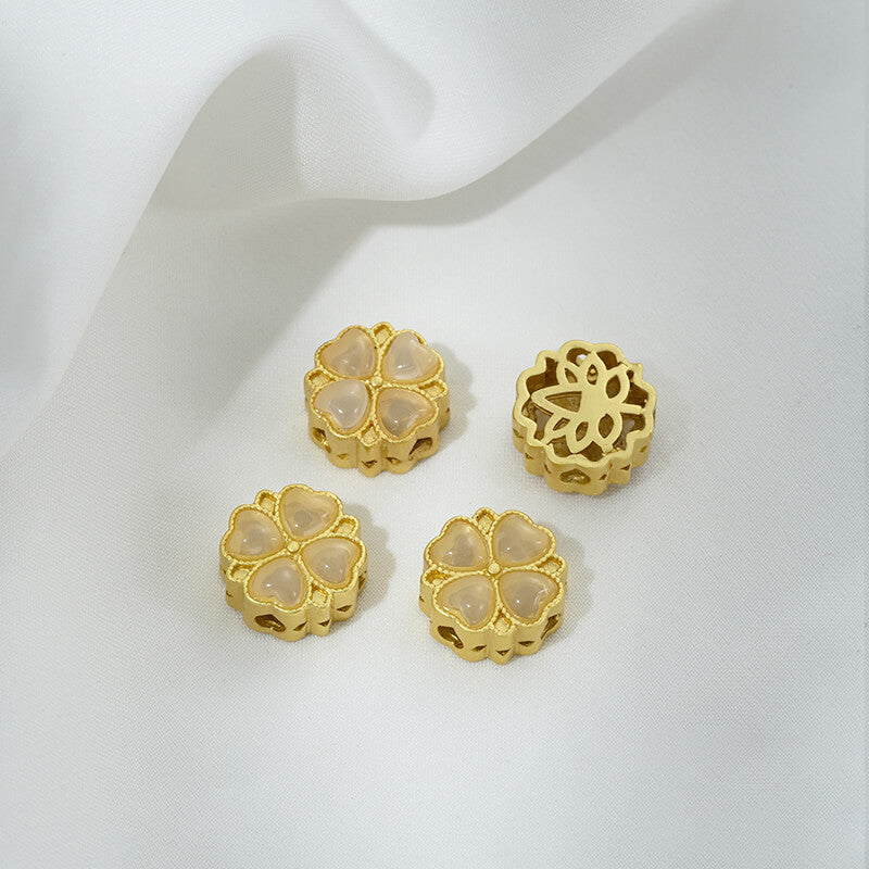 Inlaid with imitation pearls, cat's eye stones, imitation jasper colored gemstones