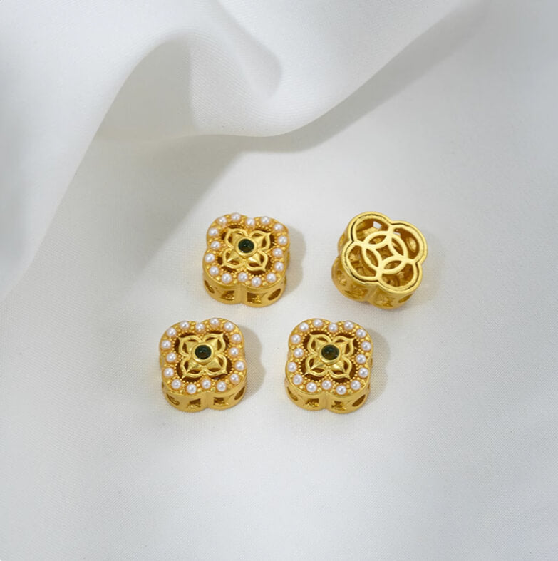 Inlaid with imitation pearls, cat's eye stones, imitation jasper colored gemstones