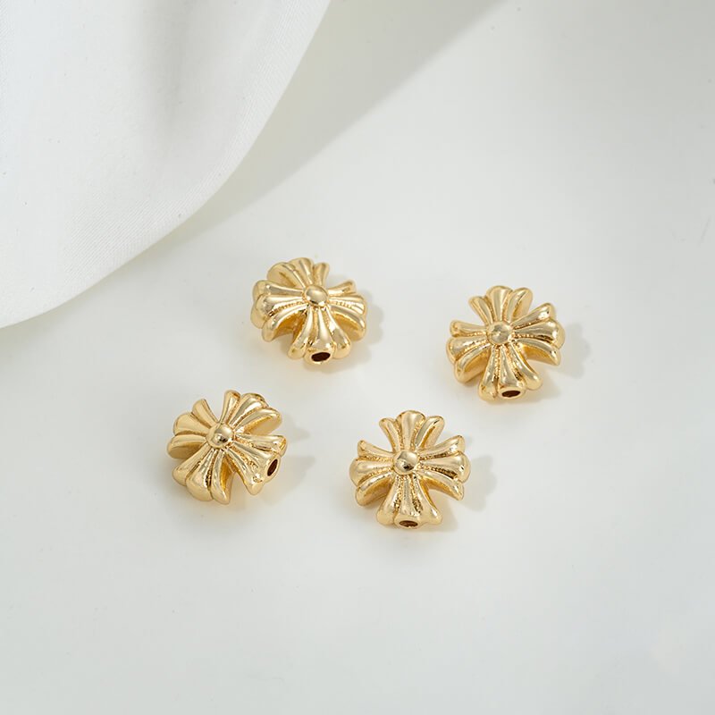 3D cross through-hole spacer beads