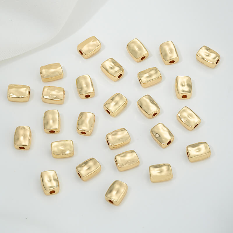 Irregular heart-shaped perforated spacer beads