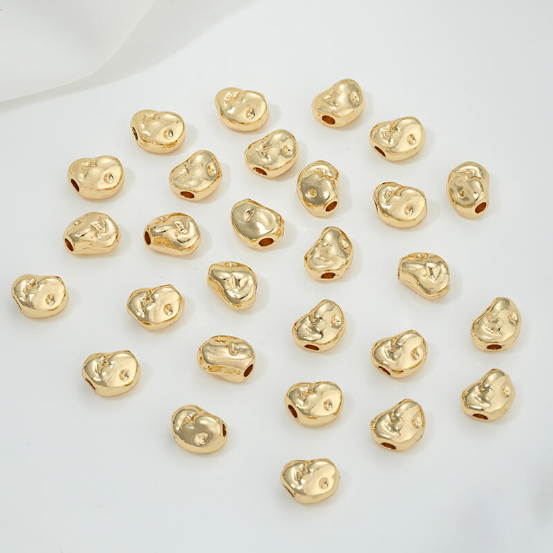Irregular heart-shaped perforated spacer beads