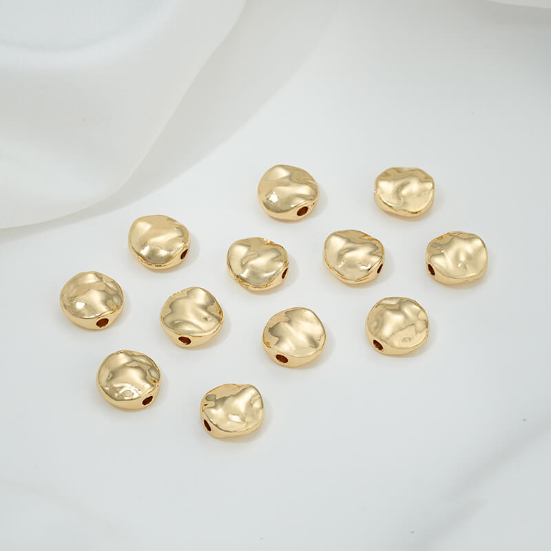 Irregular heart-shaped perforated spacer beads