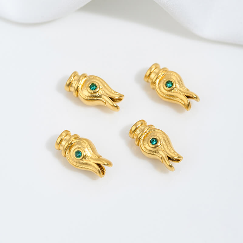 Sand gold inlaid with ruby and green diamonds, spacer beads