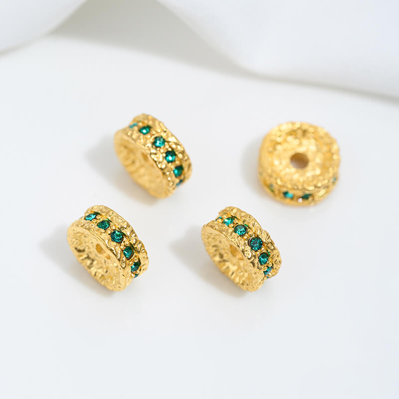 Sand gold inlaid with ruby and green diamonds, spacer beads