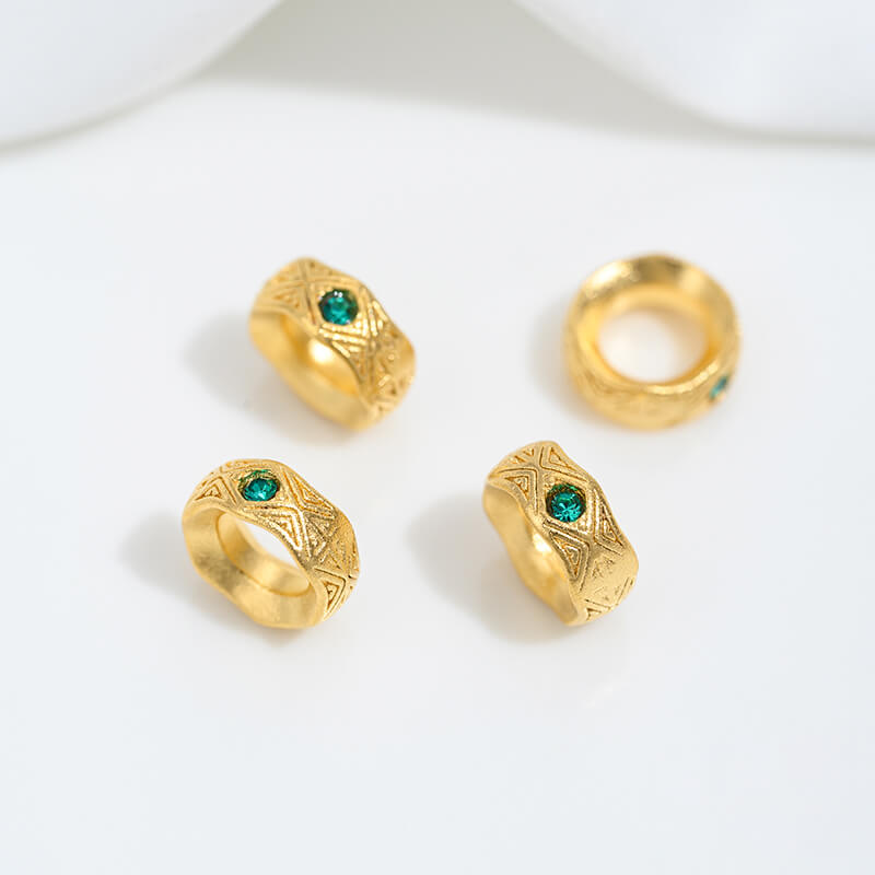Sand gold inlaid with ruby and green diamonds, spacer beads