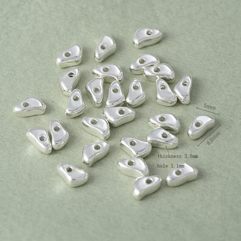 Copper-clad thick sterling silver irregular stone-shaped spacer beads