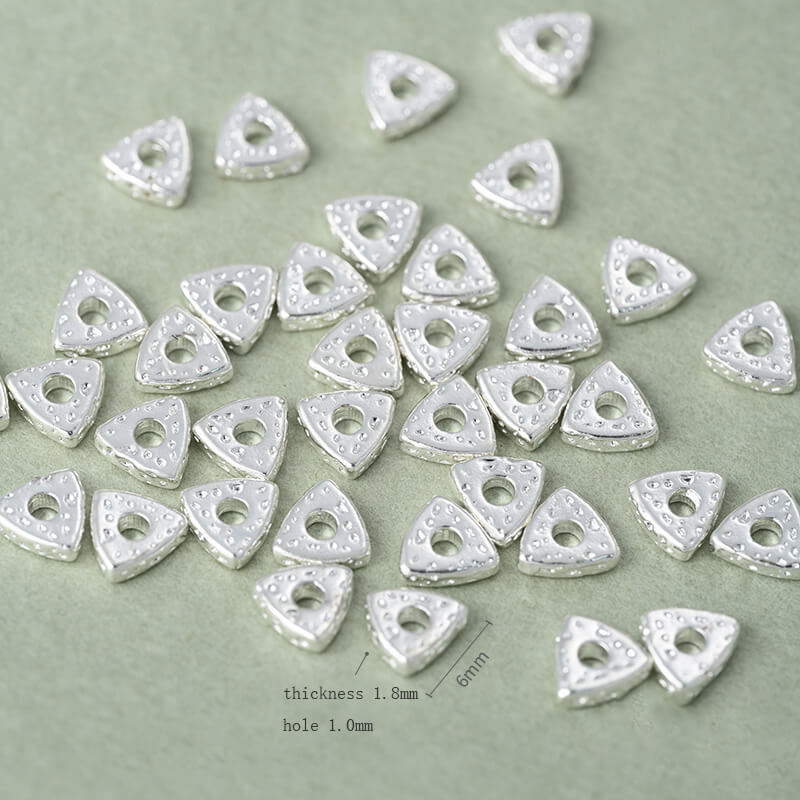 Copper-clad thick sterling silver irregular stone-shaped spacer beads