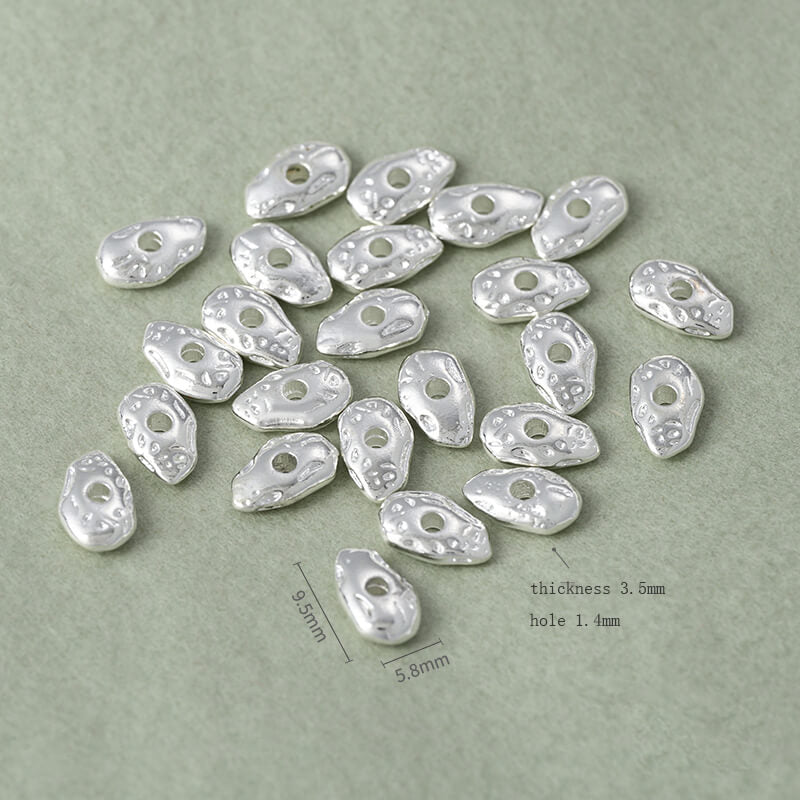 Copper-clad thick sterling silver irregular stone-shaped spacer beads