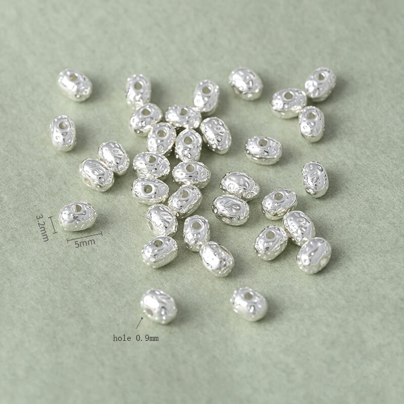 Copper-clad thick sterling silver irregular stone-shaped spacer beads